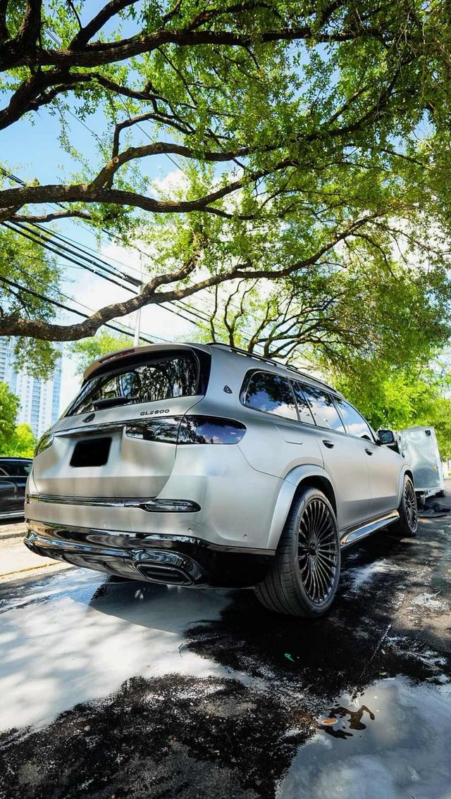 Mercedes-Maybach GLS 600 rinsed after a foam wash in a driveway, Ongowash mobile detailing serving Katy, TX