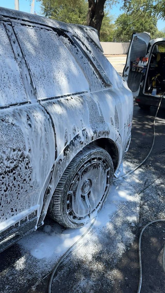 Rolls-Royce Cullinan covered in snow foam during a mobile wash, Ongowash mobile detailing serving Missouri City, TX
