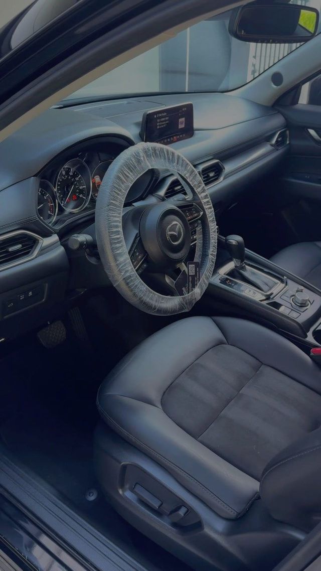 Mazda CX-5 front seats and dash after interior detailing, Ongowash mobile detailing serving Houston, TX