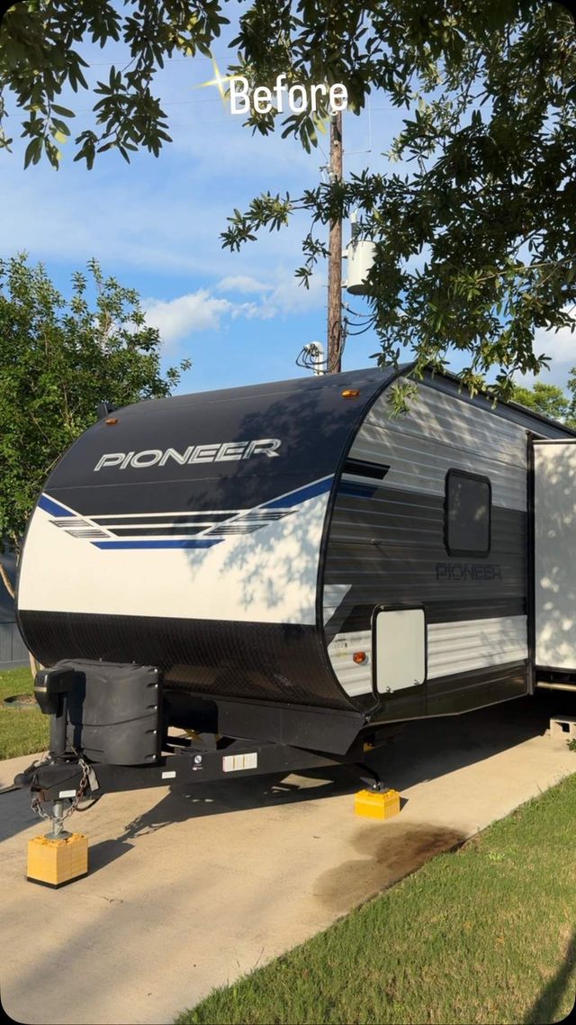 Pioneer travel trailer parked at a home before an RV wash, Ongowash mobile detailing serving Katy, TX