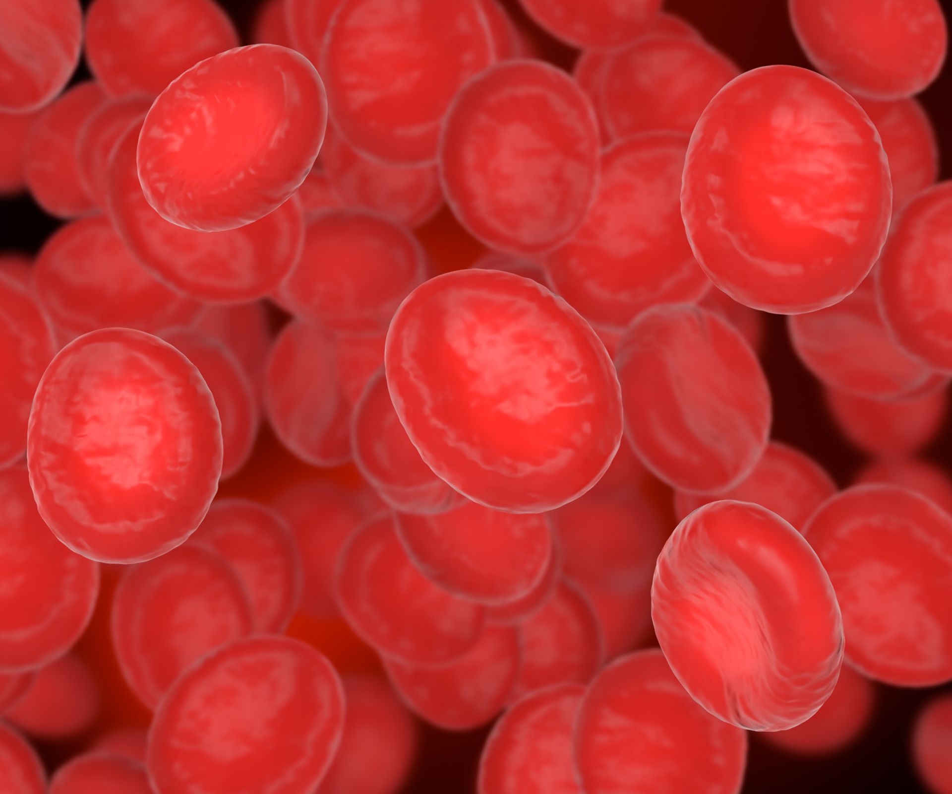 a bunch of red balls are floating in the air