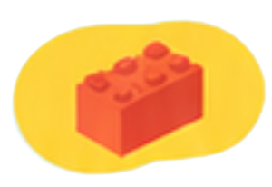 Red toy brick on a yellow background