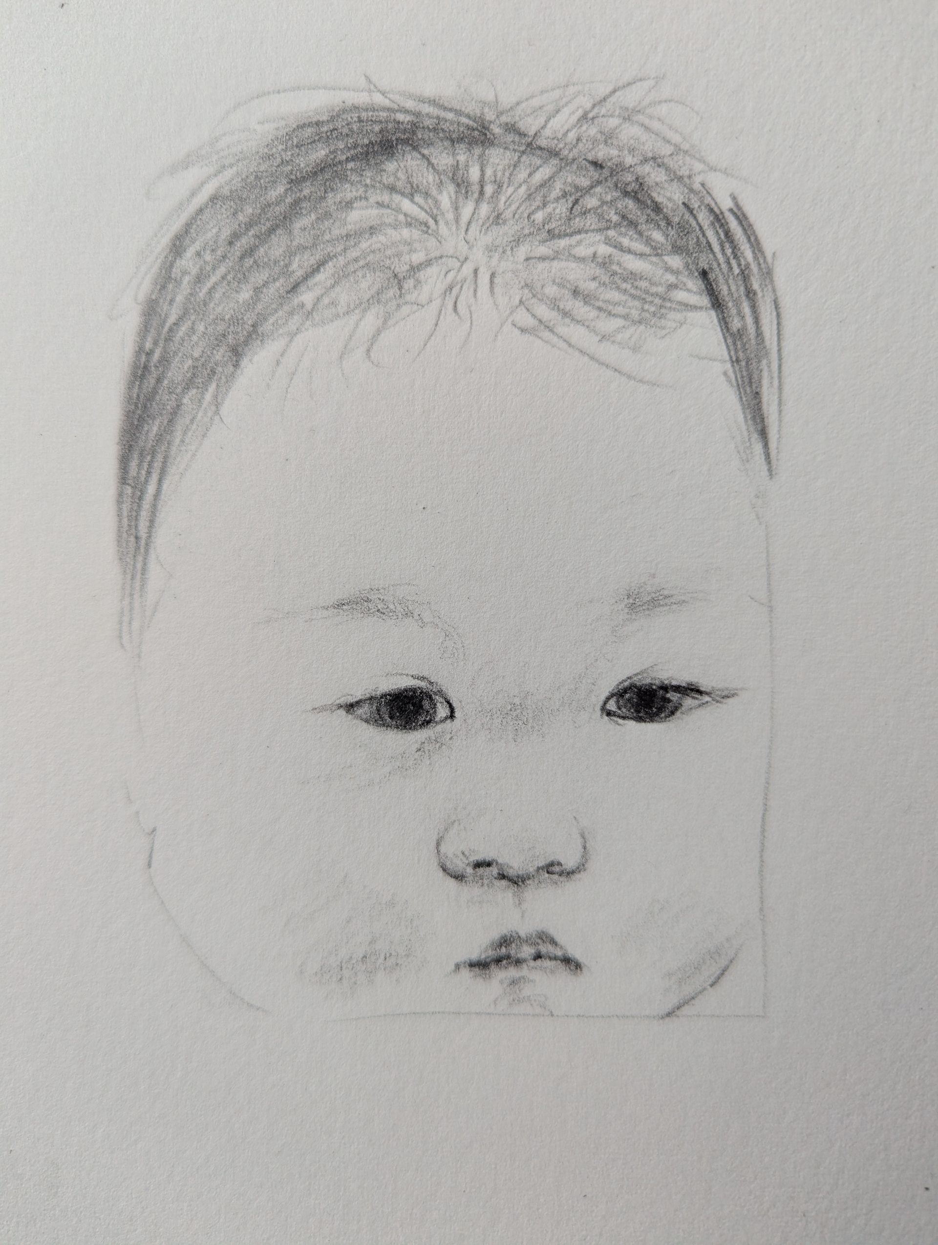 Pencil sketch of a baby's face with dark hair and slightly downcast eyes.