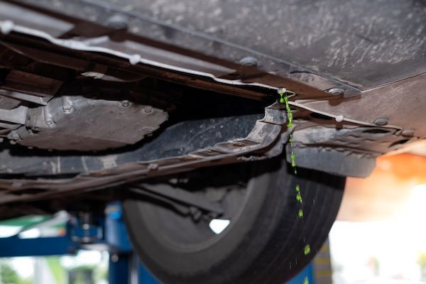 Green coolant fluid leak | Apex Automotive Group LLC in Lilburn, GA