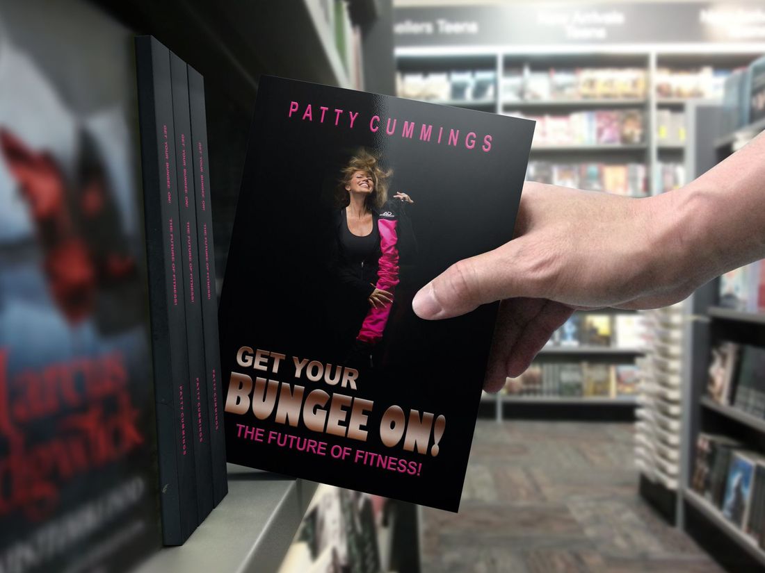 A person is holding a book titled get your bungee on