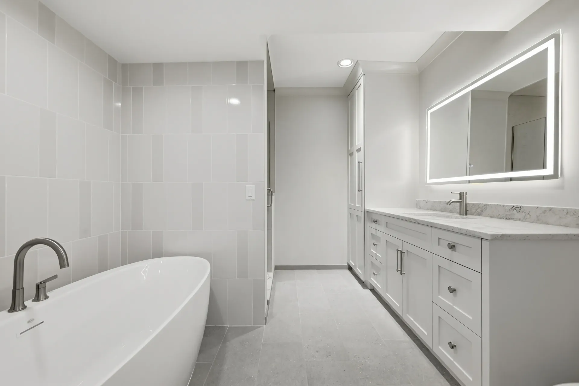 Bathroom remodeling project in Bennington NE with walk-in shower and modern tile design