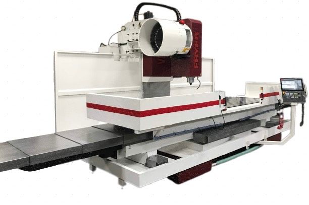CNC machine in a workshop, white and red, with a control panel and large cutting head.