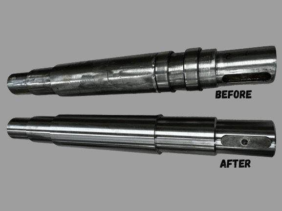 Two metal shafts, one before and after cleaning/polishing, show rust removal and shine.