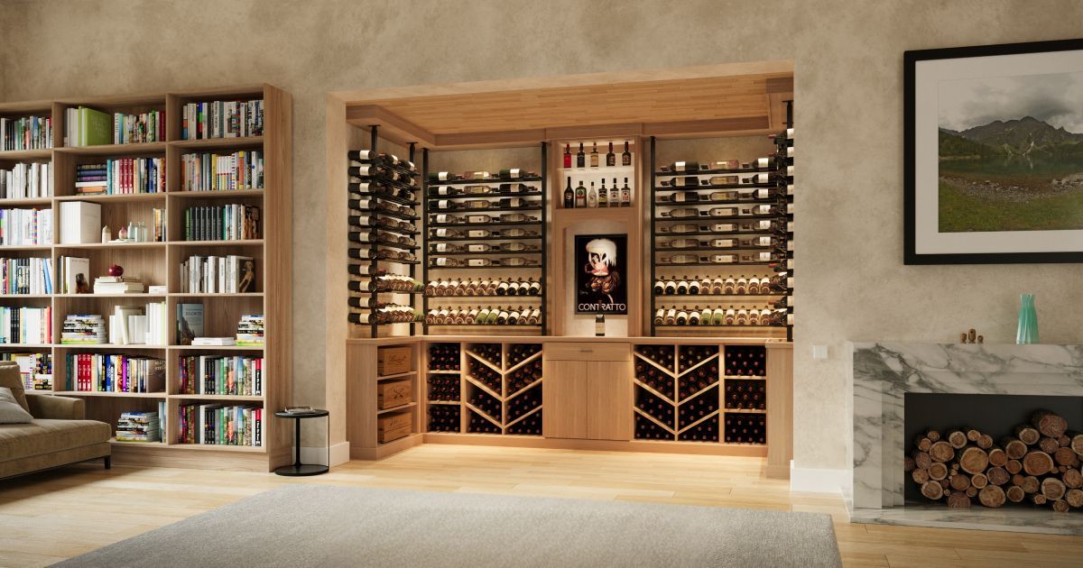Cozy living room with built-in wine storage, bookshelves, stone fireplace, and framed wall art