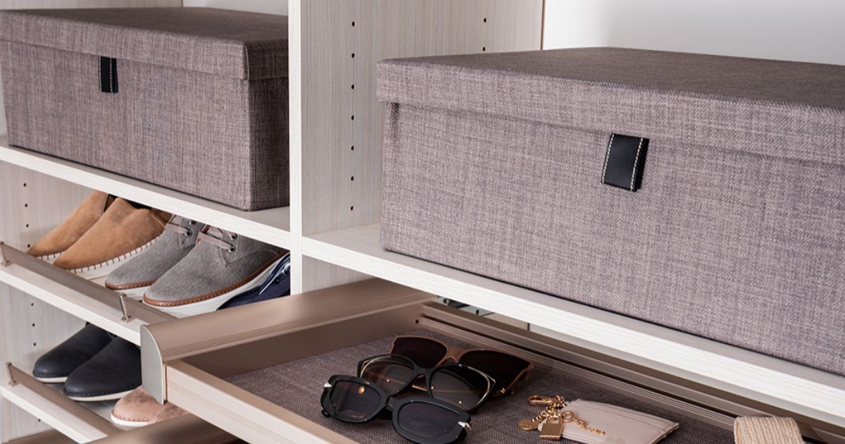 Closet shelves with shoes and sunglasses in gray storage boxes