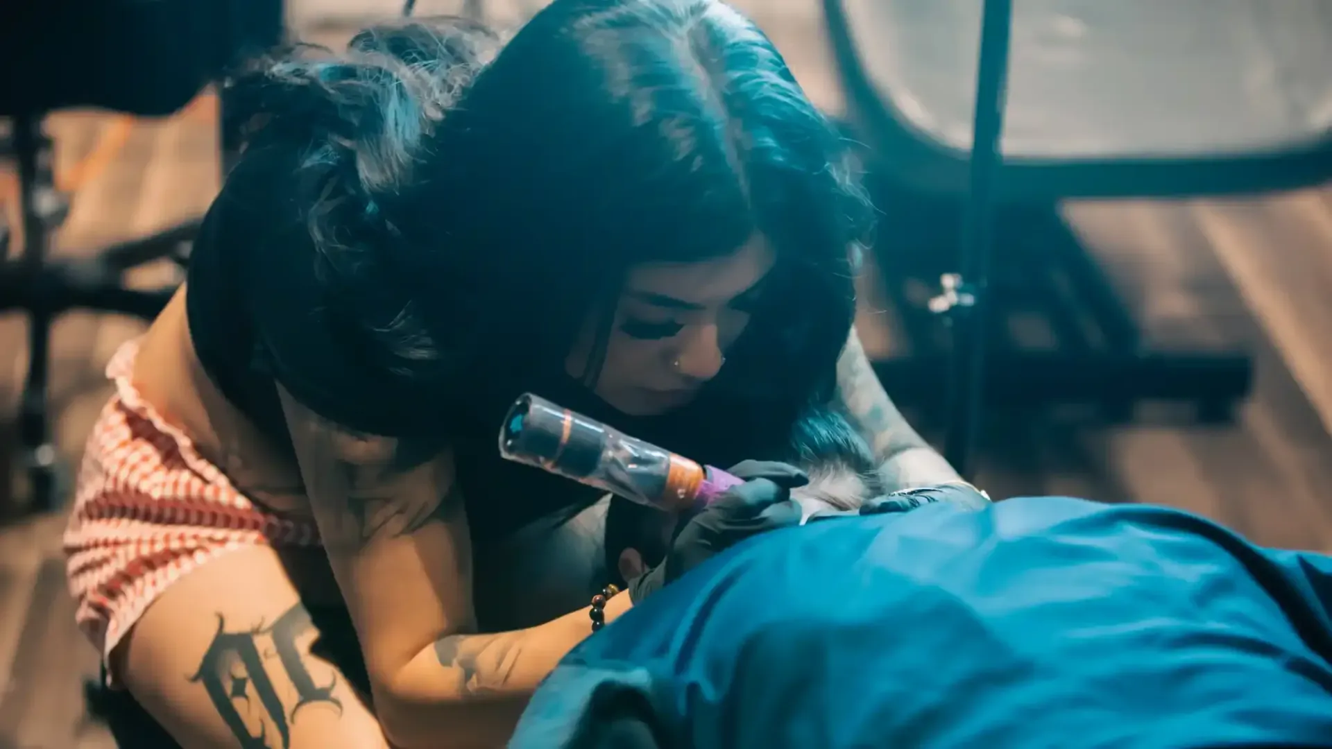 close up of Nessa tattooing