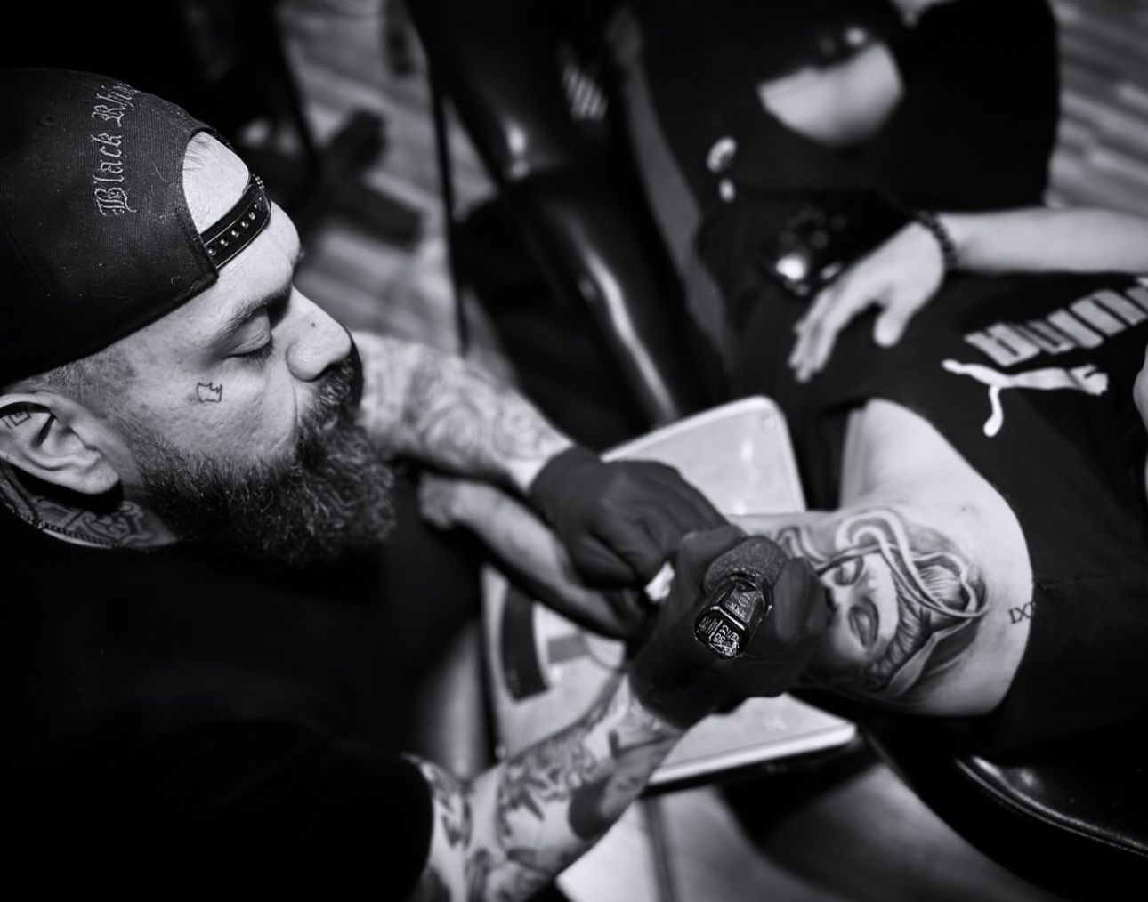 Igor working on a Buddhist tattoo