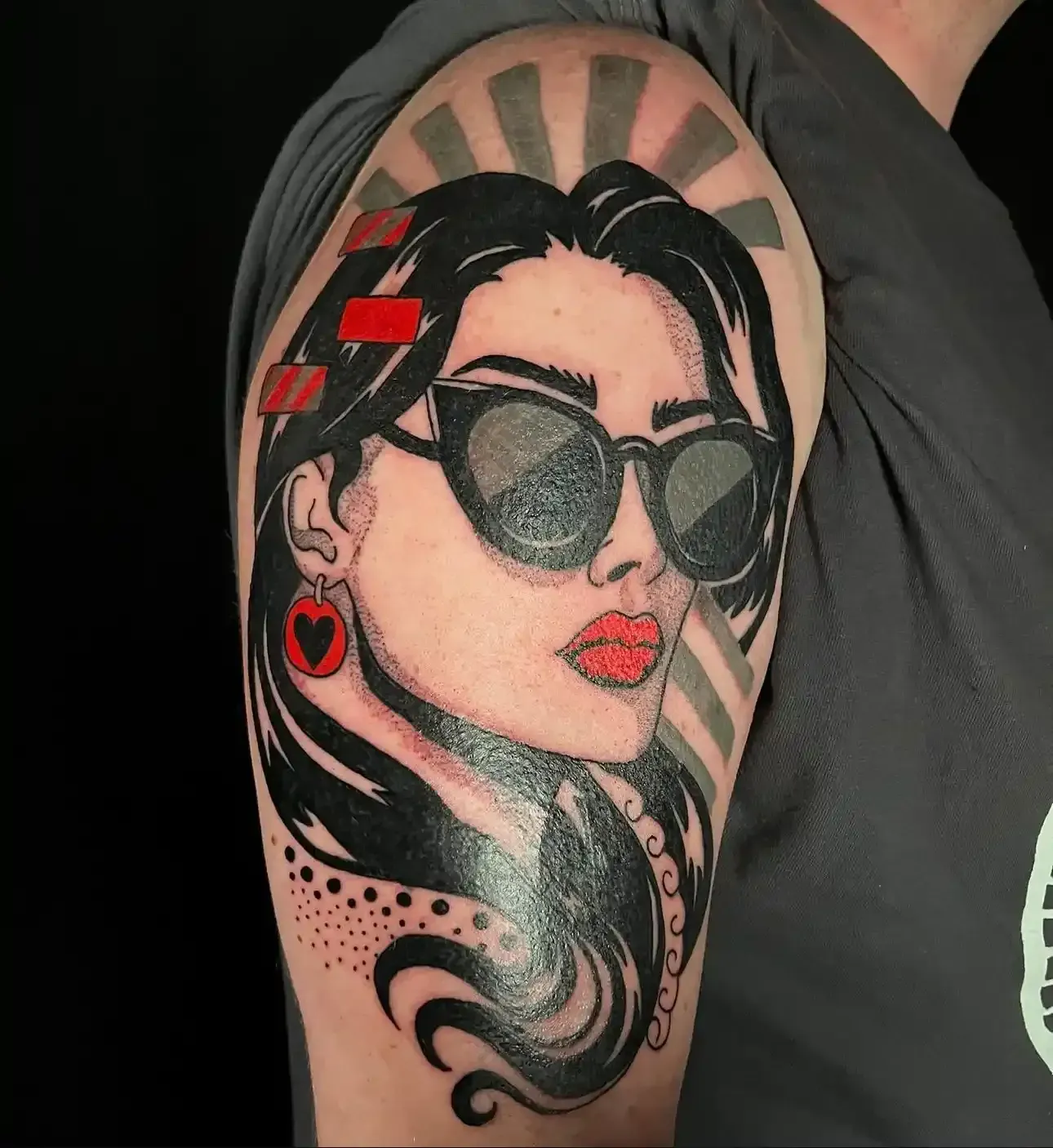 Comparison of black and grey and color portrait tattoos on skin