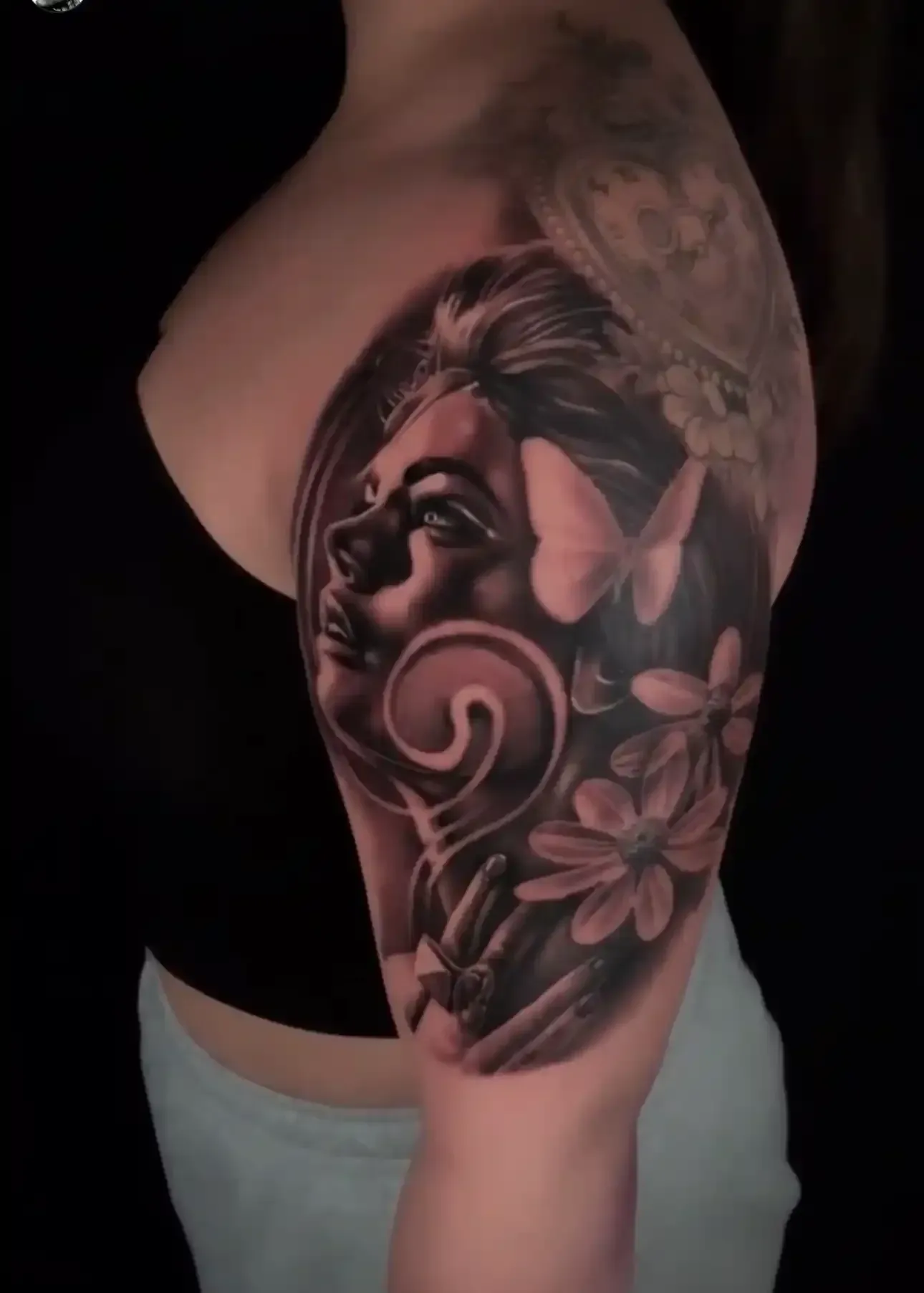 artistic portrait tattoo of a woman by Alex 