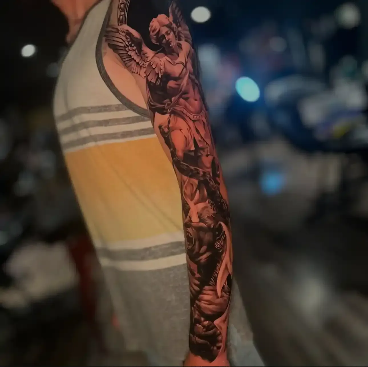 Archangel Michael full sleeve tattoo by Mickey 