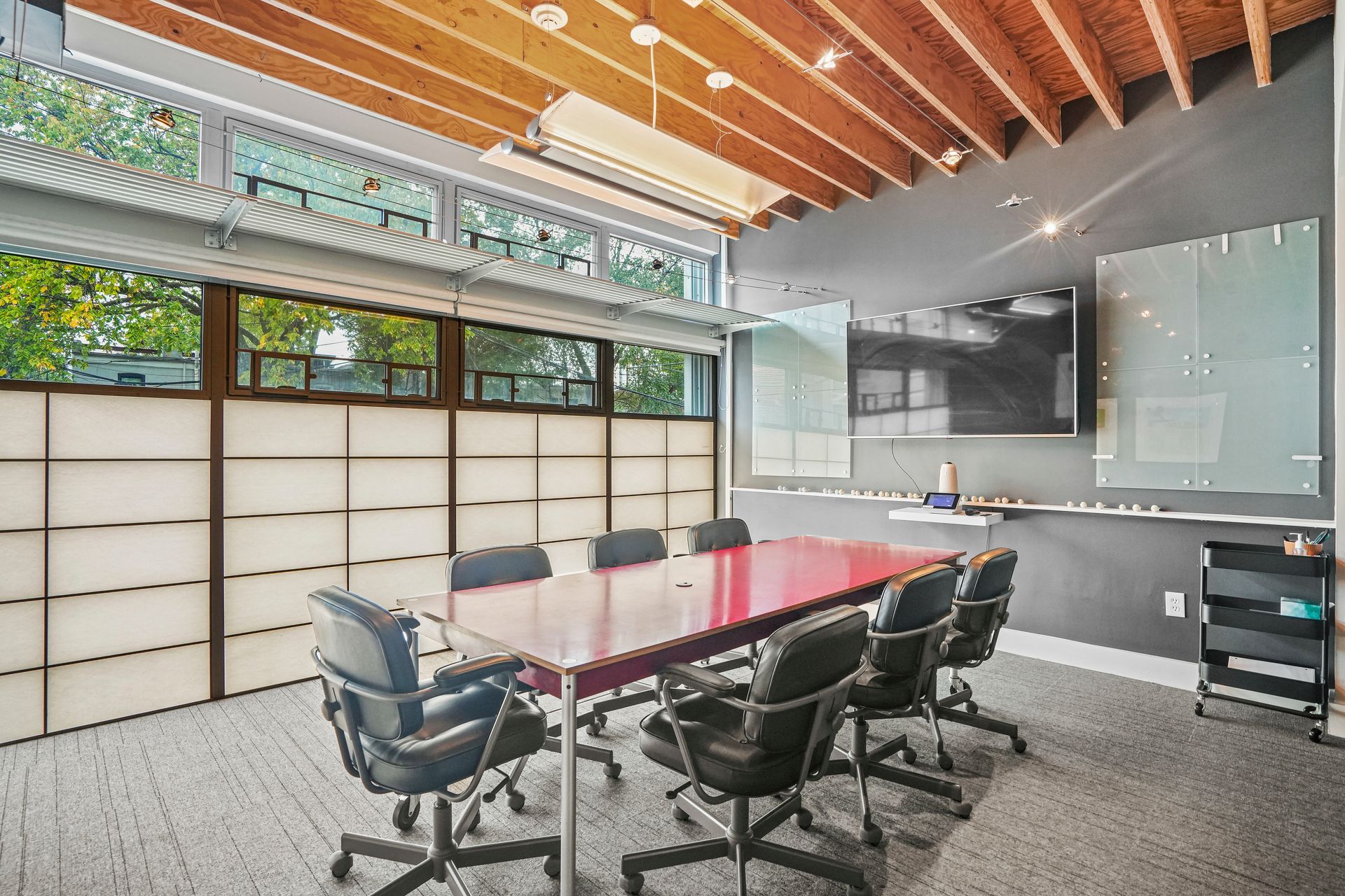 Large conference room with floor-to-ceiling windows
