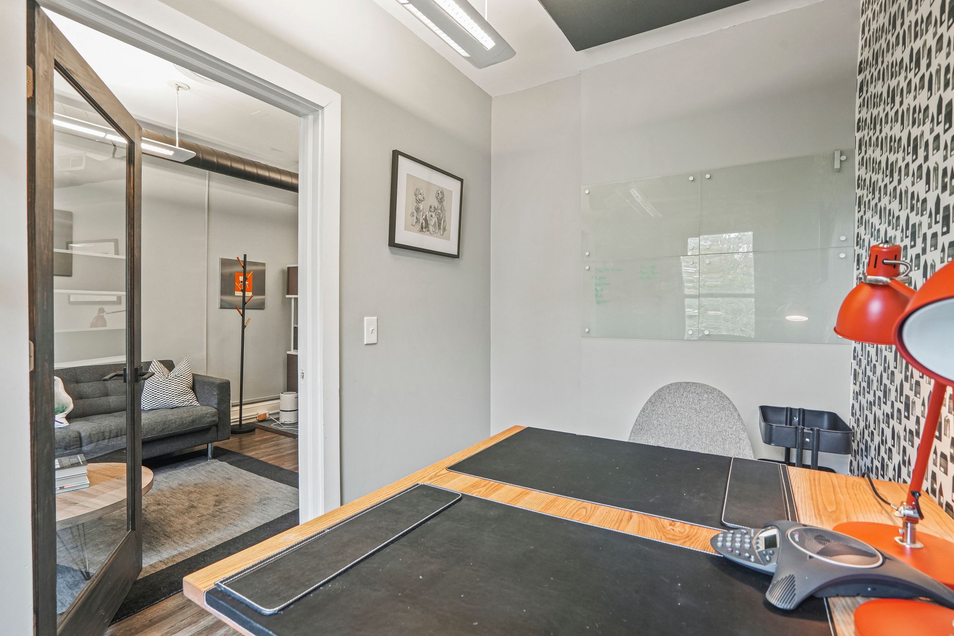 Private office with desk and contemporary furnishings
