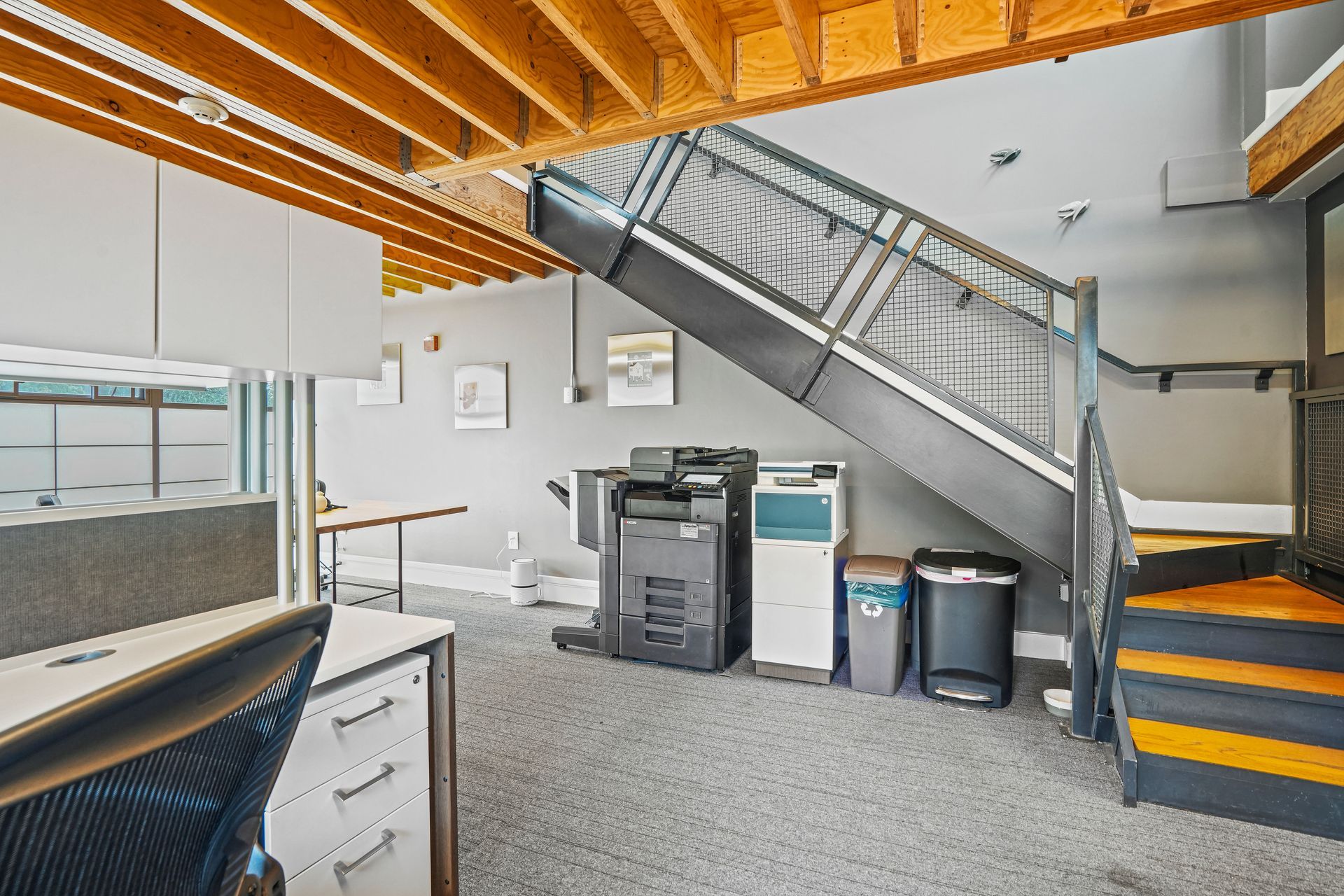 Office cubicles with modern desks and open layout