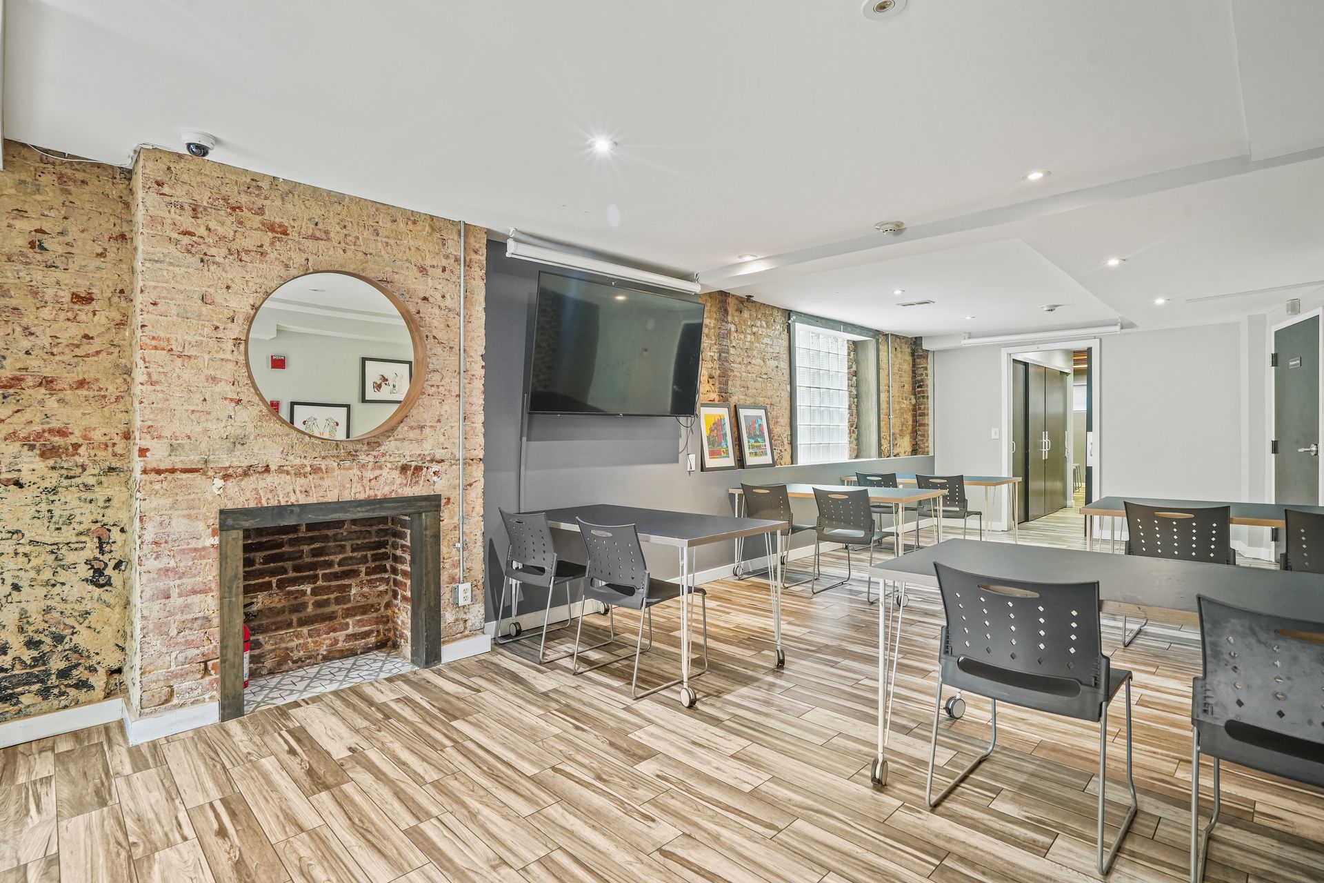 Open commercial space with staircase and flexible seating area