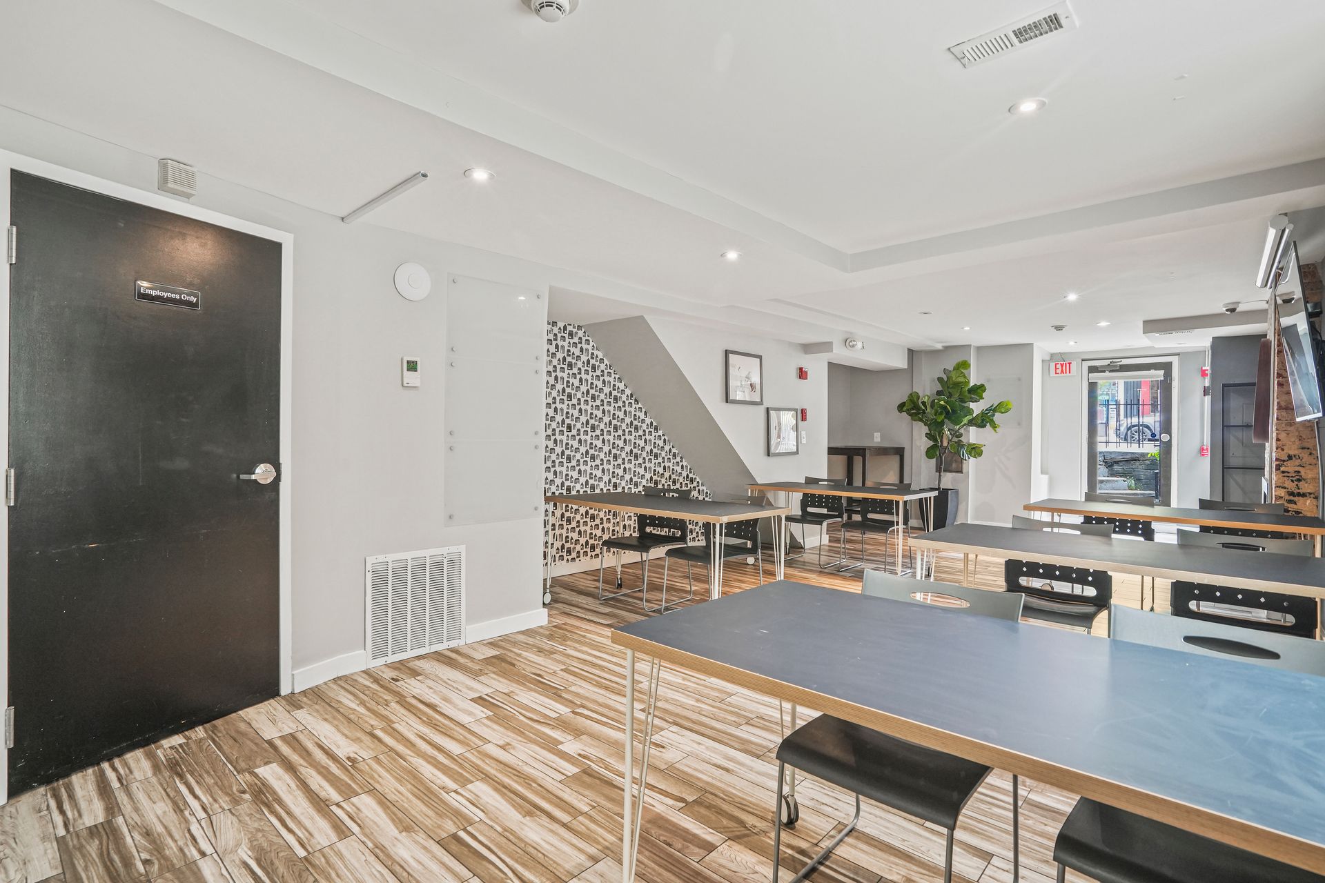 Multi-purpose workspace with ping pong table and seating area