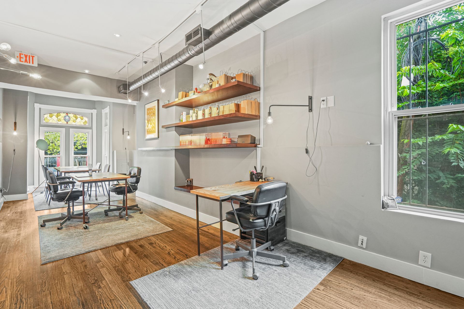 Spacious commercial event space with fireplace and seating area