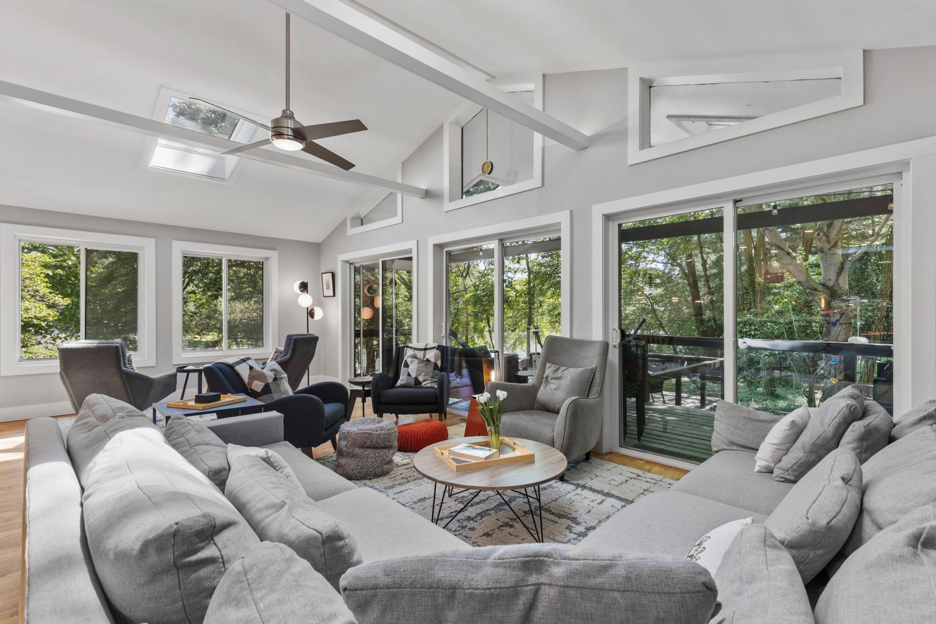 Open-concept living room and kitchen with modern design