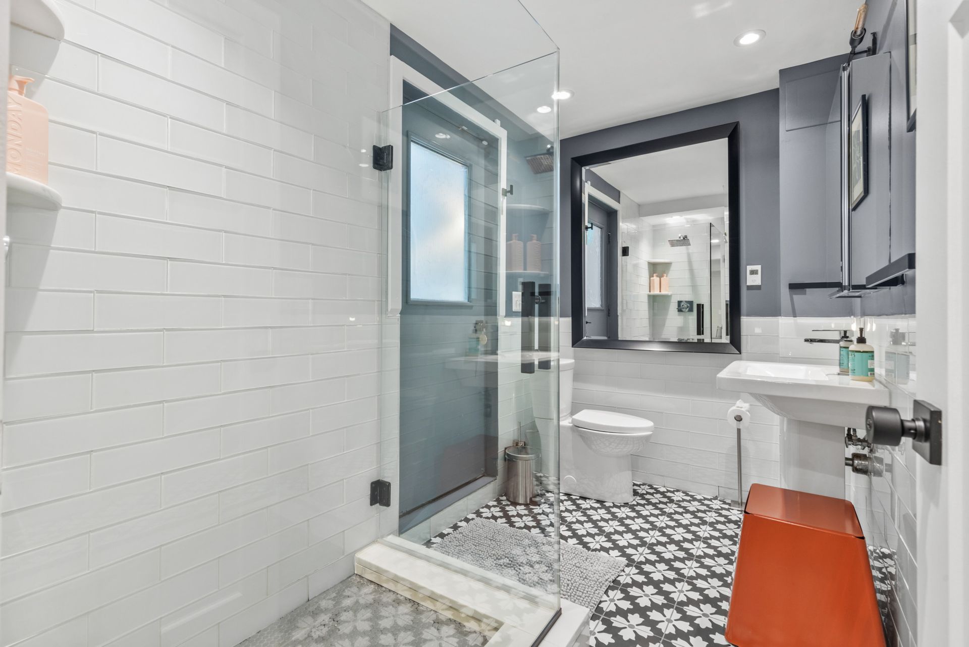 Contemporary bathroom with walk-in shower and modern fixtures