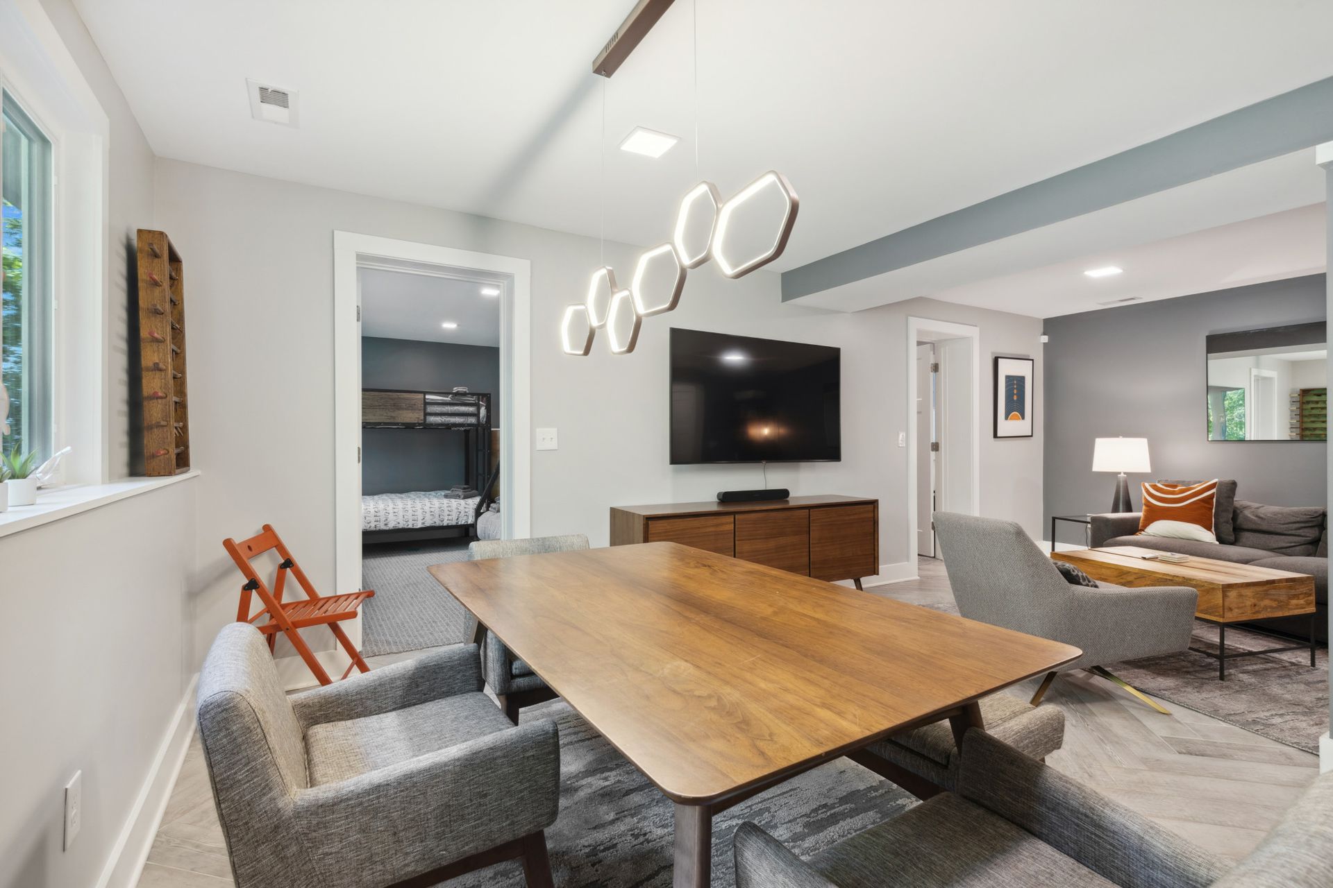 Elegant dining room with decorative mirror and wood table