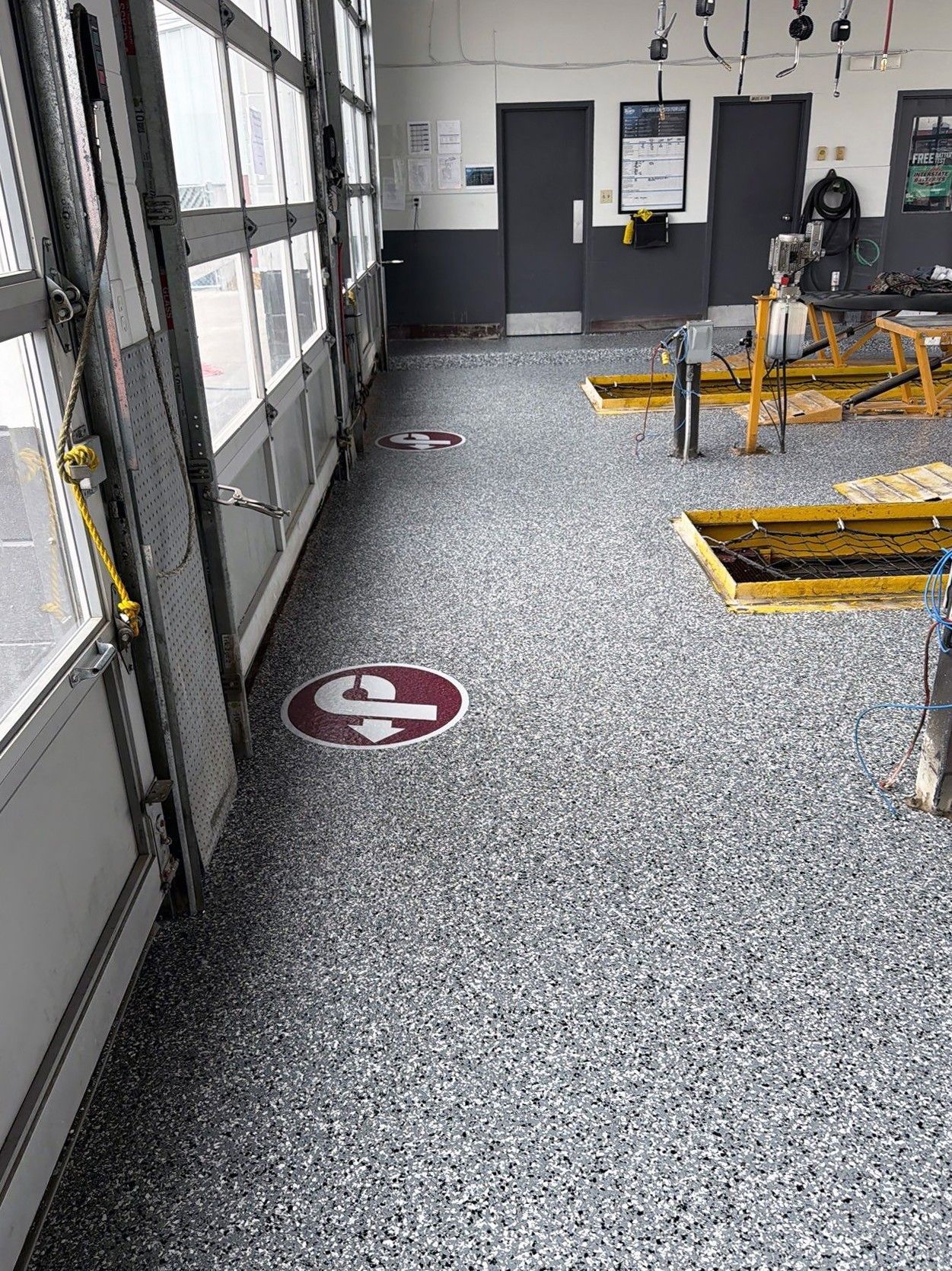 Automobile service bay with full-flake epoxy floor