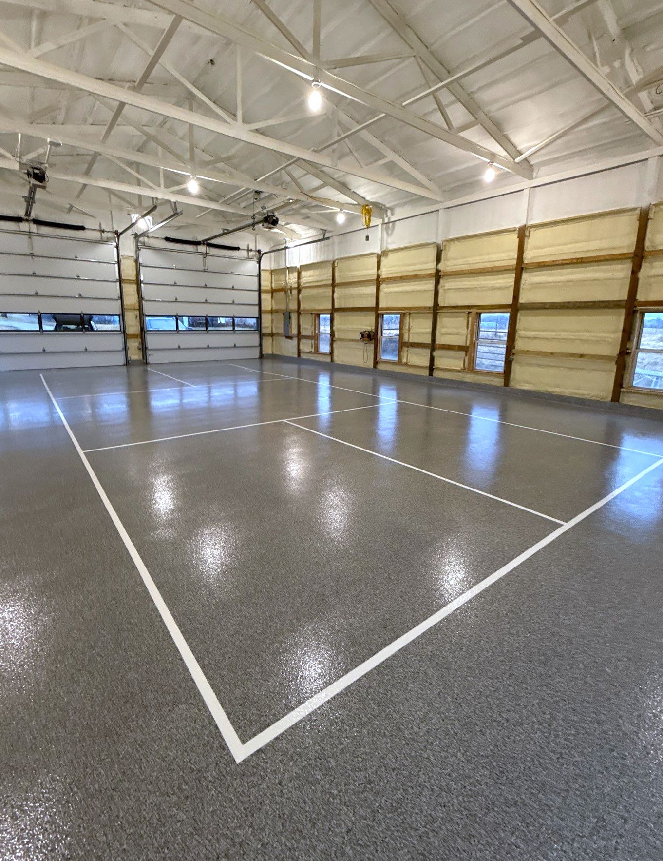 Custom epoxy floor and pickleball court