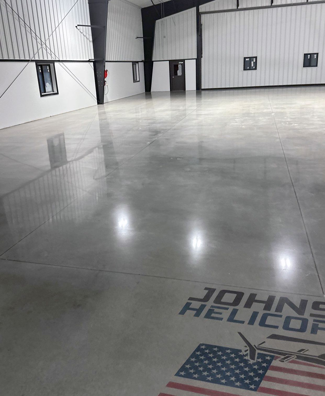 Aviation building interior with polished concrete floor