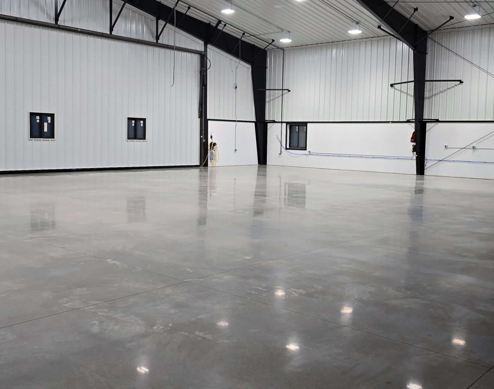 Aviation building interior with polished concrete floor
