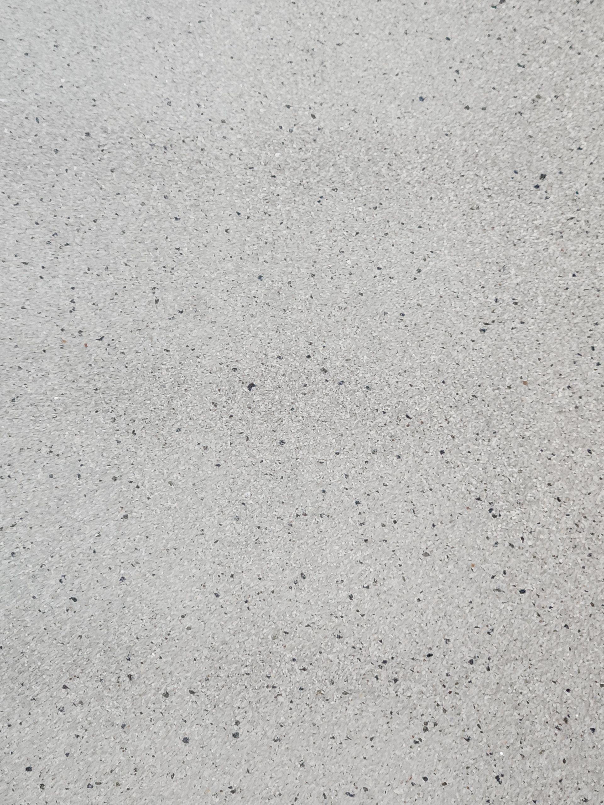 Close-up of polished concrete floor in corporate office building