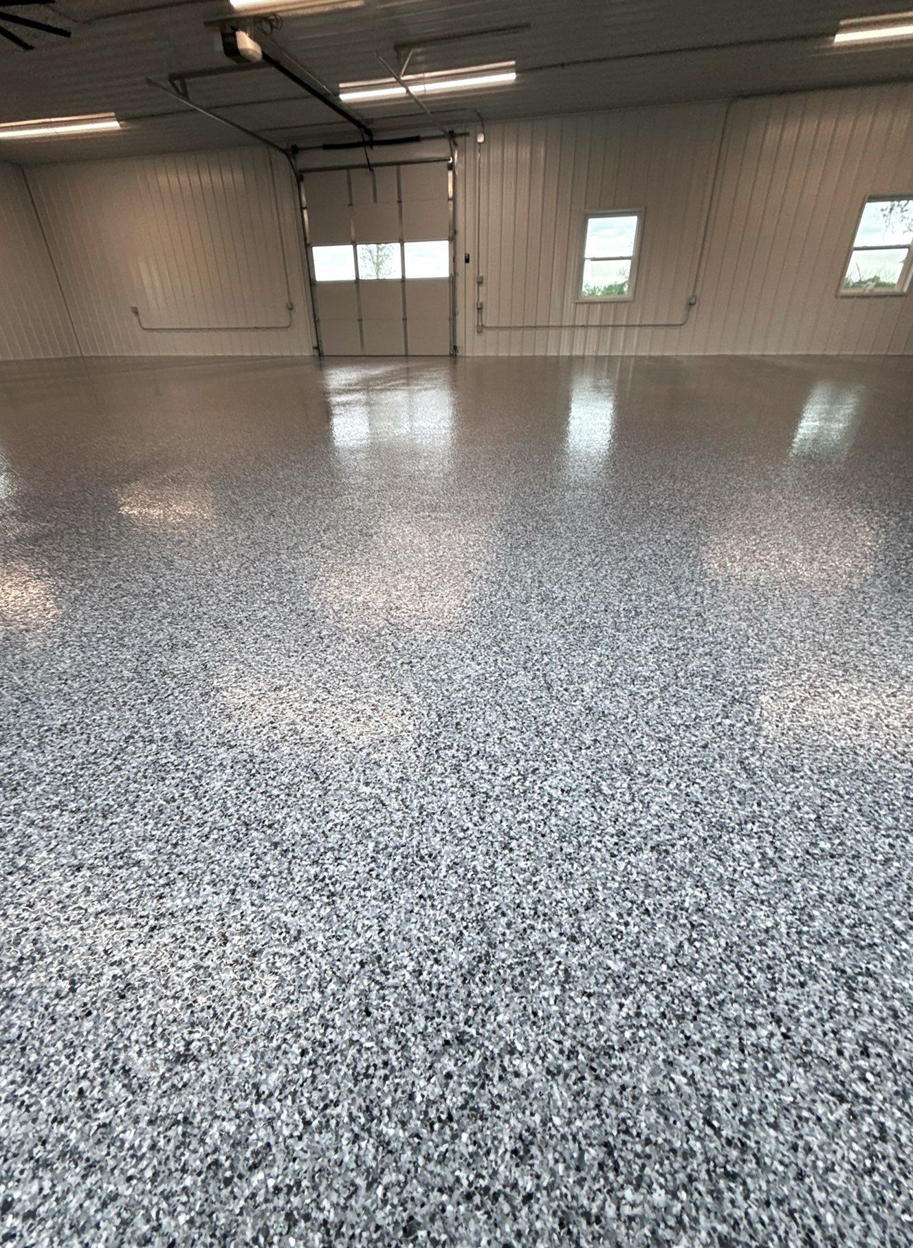 Shop floor in northwest Missouri with full-flake epoxy coating