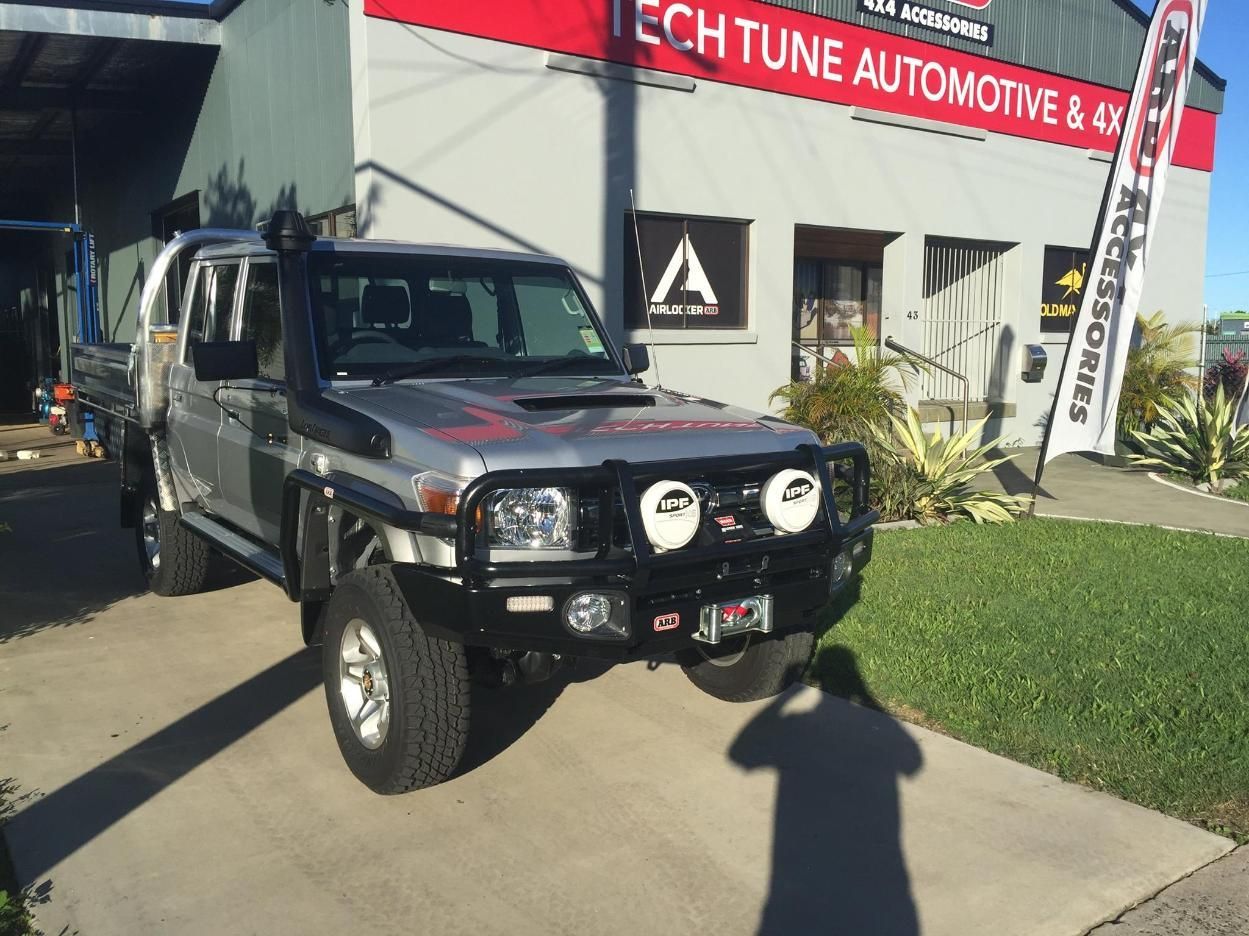 A Truck Is Parked In Front Of A Building Tune Automotive & 4x4 — Tech Tune Automotive and 4x4 ARB In Innisfail, QLD