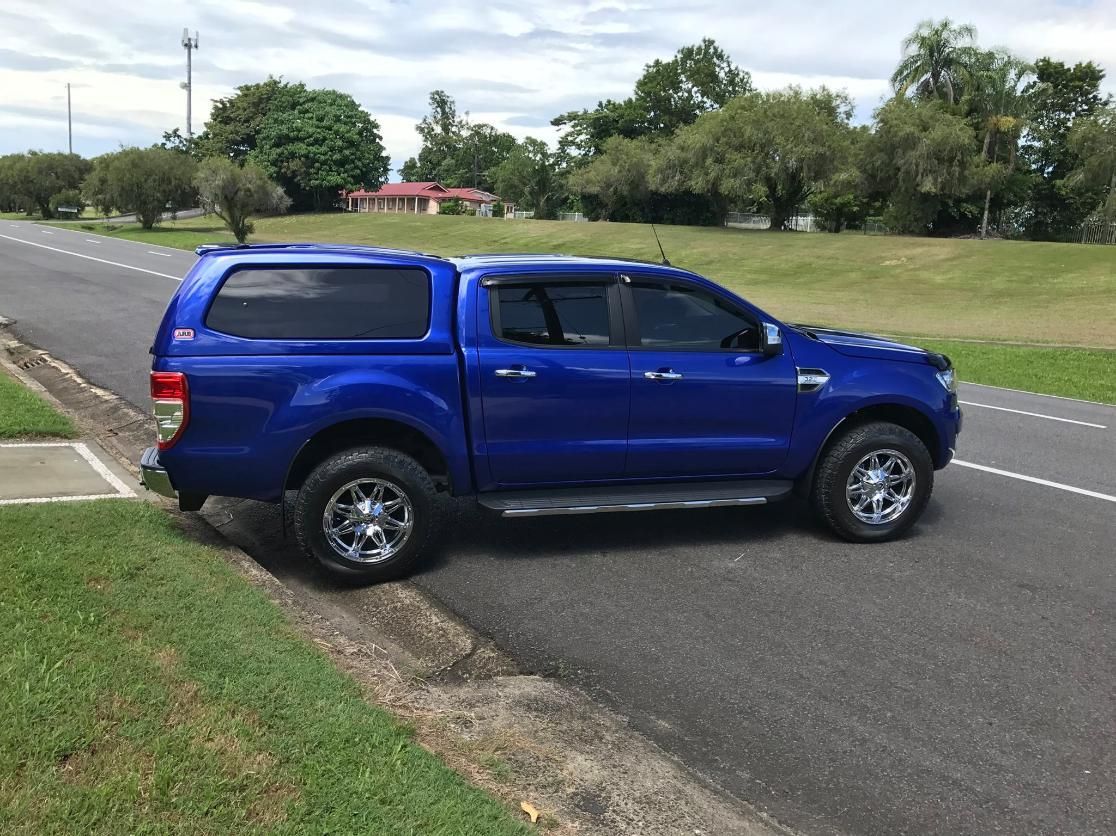 A Blue Truck With A Canopy Is Parked On The Side Of The Road — Tech Tune Automotive and 4x4 ARB In Innisfail, QLD