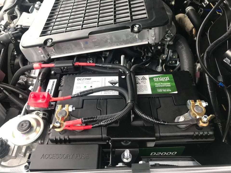 A Close Up Of A Car Engine With A Battery Attached To It — Tech Tune Automotive and 4x4 ARB In Innisfail, QLD
