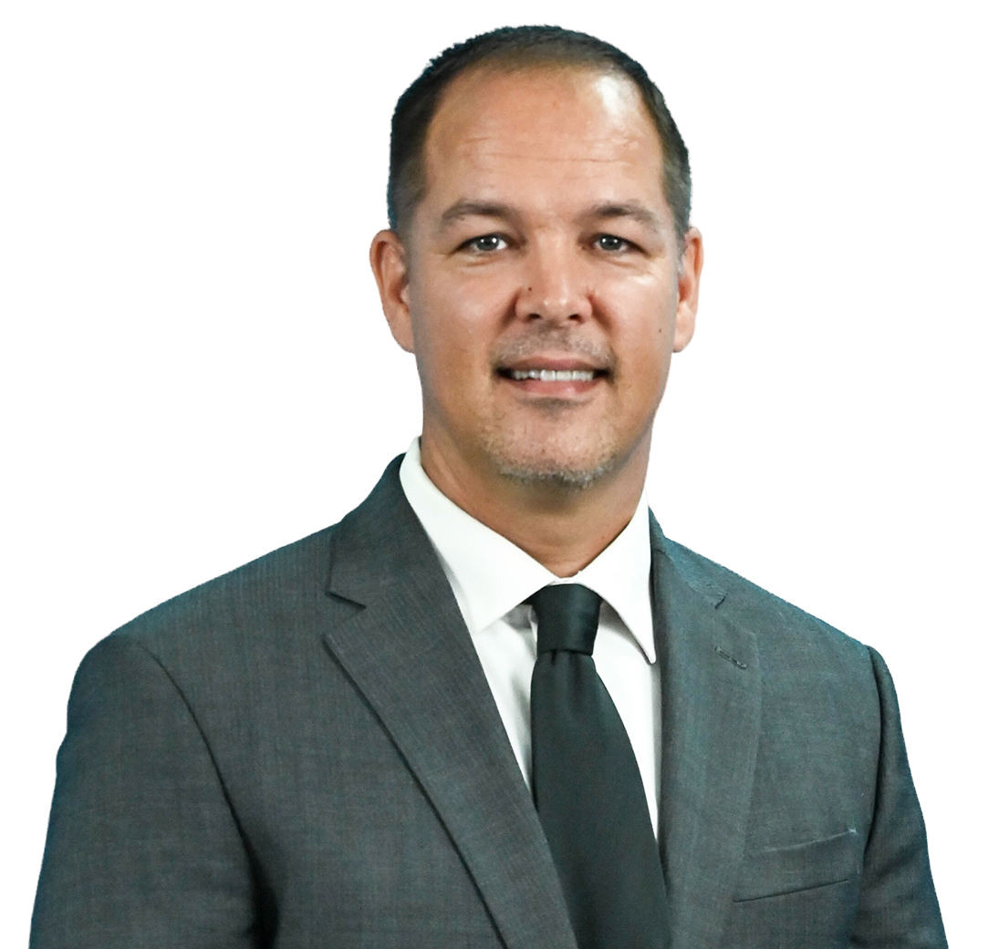 Professional headshot of a man in a gray suit with a black tie on a white background