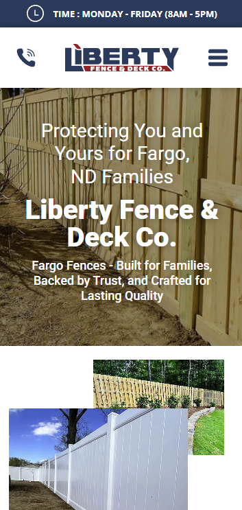 Liberty Fence & Deck website homepage showing white fencing and a backyard fence project