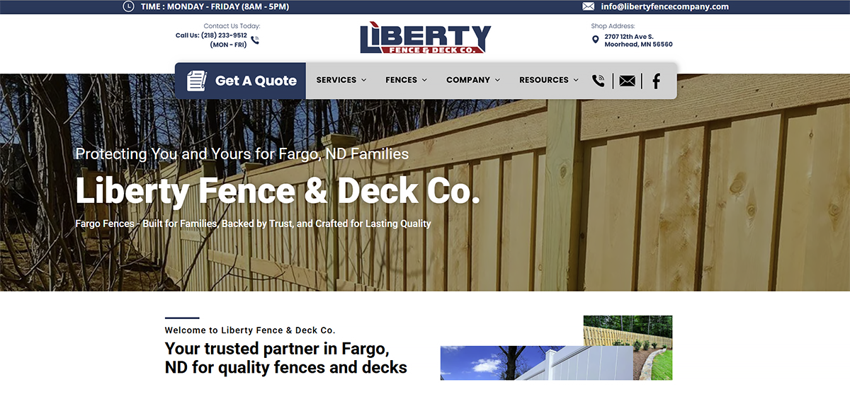 Liberty Fence & Deck Co. website homepage with fence banner and contact bar