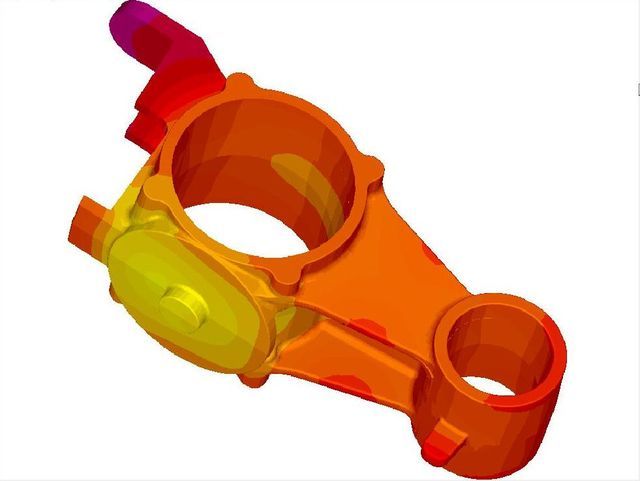 Modello CAD 3D di un componente meccanico del fuso a snodo dello sterzo, visualizzato tramite una mappa termica che mostra le sfumature di colore dal giallo al rosso.