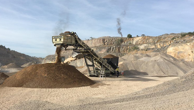 mobile tracked pugmill which is capable of producing high quality material blending for stabilizing road based materials with the addition of water, cement, lime and can also be used for blending at asphalt plants, cold emulsified asphalt mixing (Cold Mix) to Roller compacted Concrete (RCC) and flowable backfill and pre-coating.