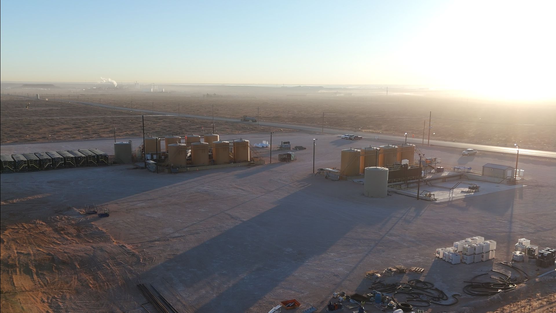 An aerial view of a large industrial area in the middle of a desert.