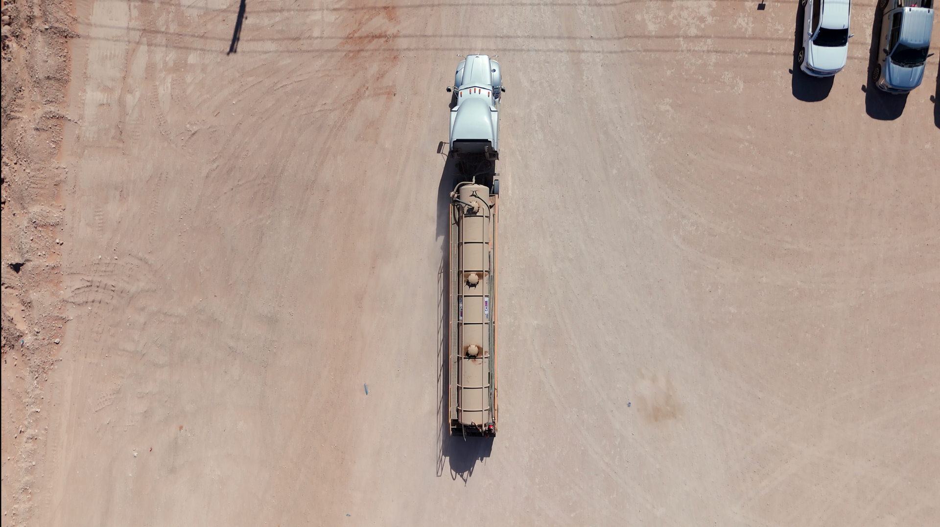An aerial view of a large body of water in the middle of a desert.