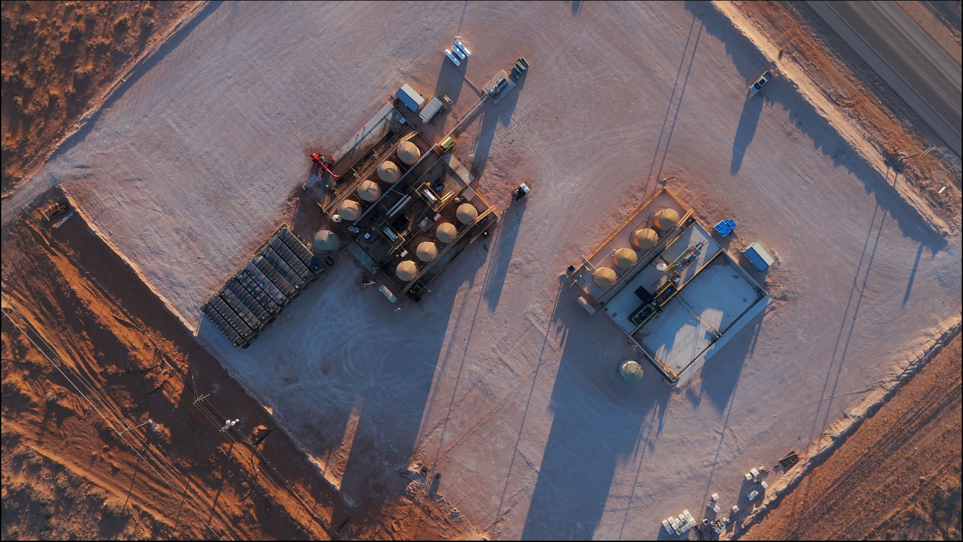 An aerial view of a construction site in the desert