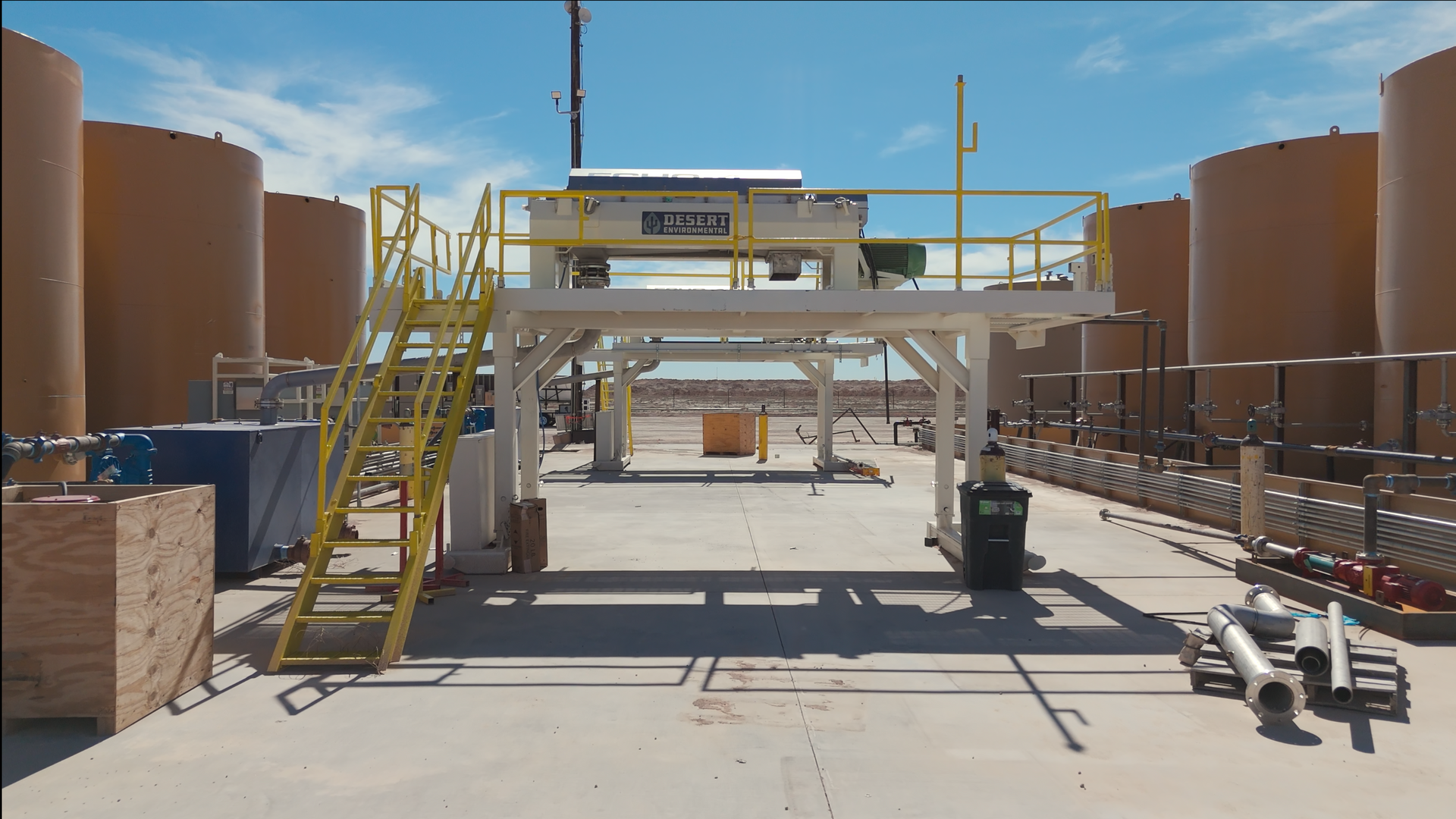 An aerial view of a gas station in the desert