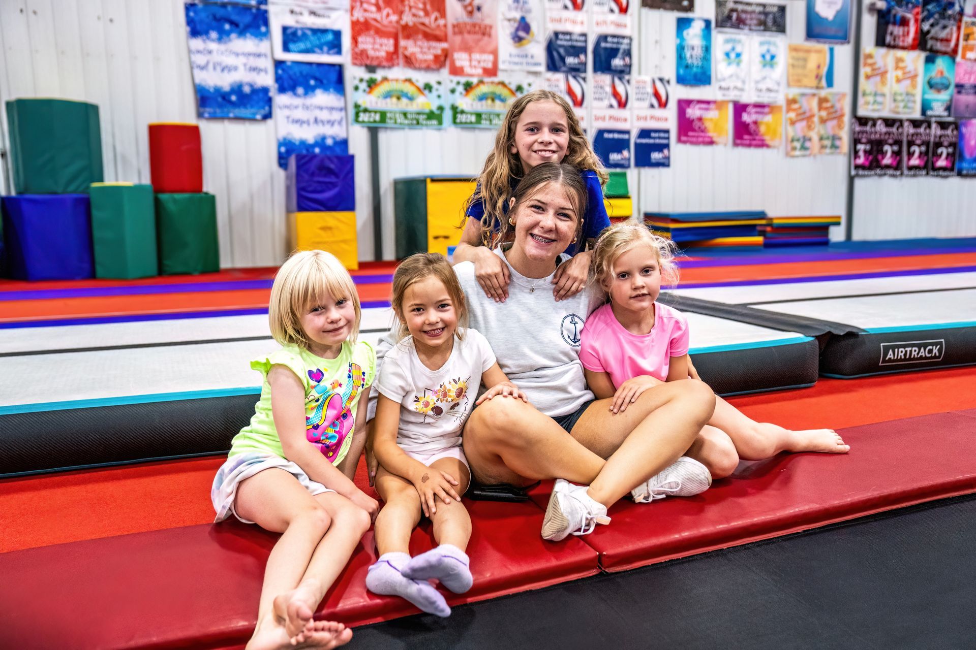 Teacher with camp kids at Kids First Too