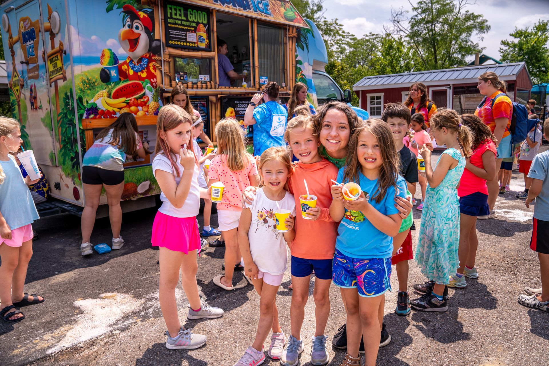 Camp kids having kona ice