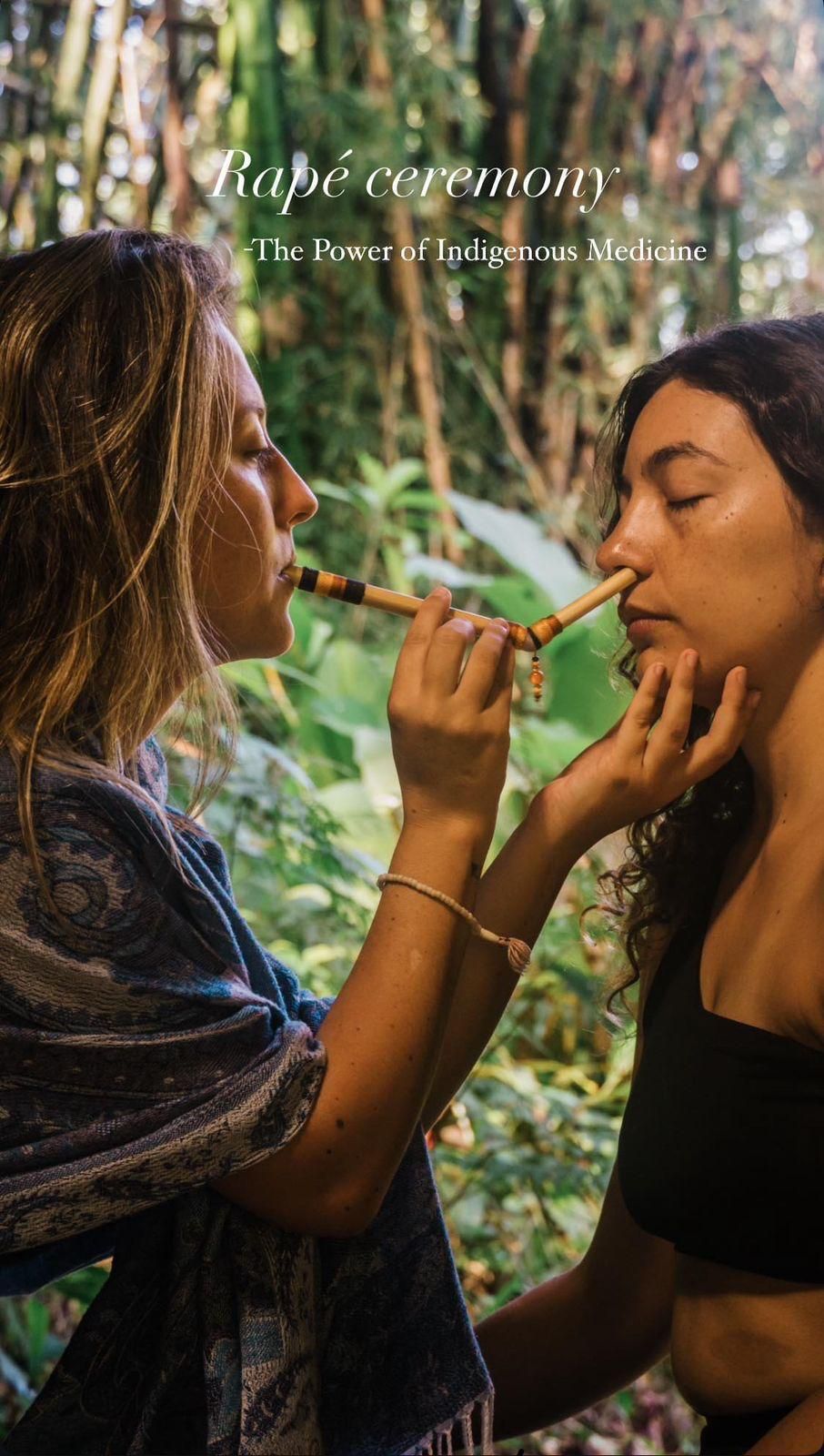A woman is applying makeup to another woman 's face.