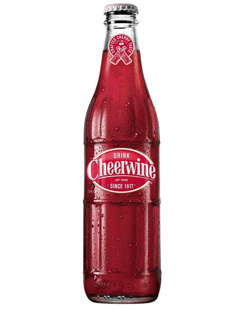 A red glass Cheerwine soda bottle on a white background.